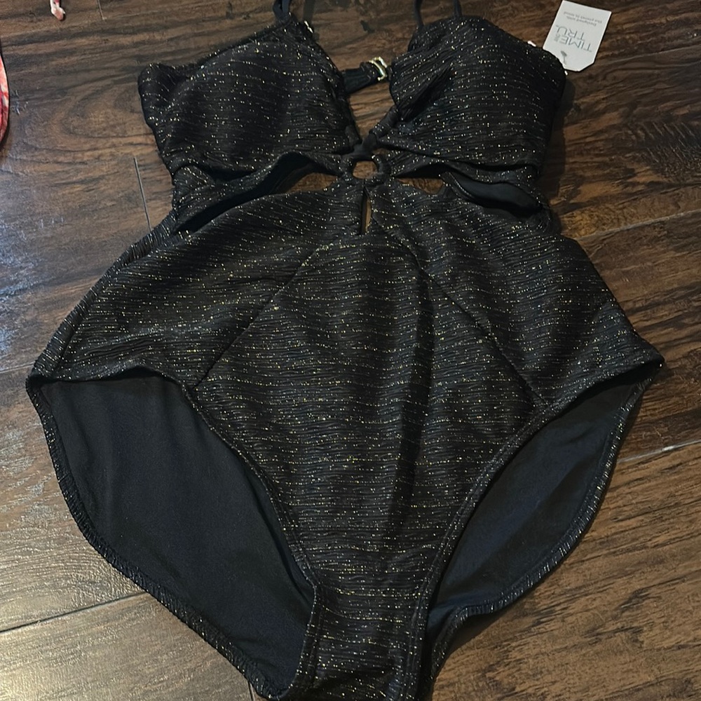 Never worn one piece
